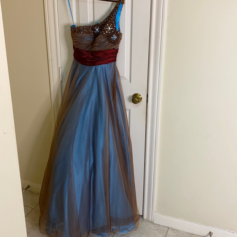 Sapphire blue formal dress with brown overlay.